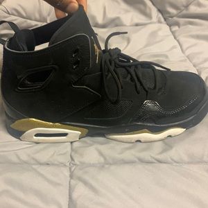 Nice black and gold Jordan’s